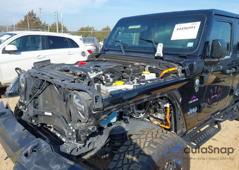 2021 Jeep Wrangler 4Xe Unlimited Sahara 4X4 z USA, uszkodzony, nr VIN 1C4JJXP62MW843463